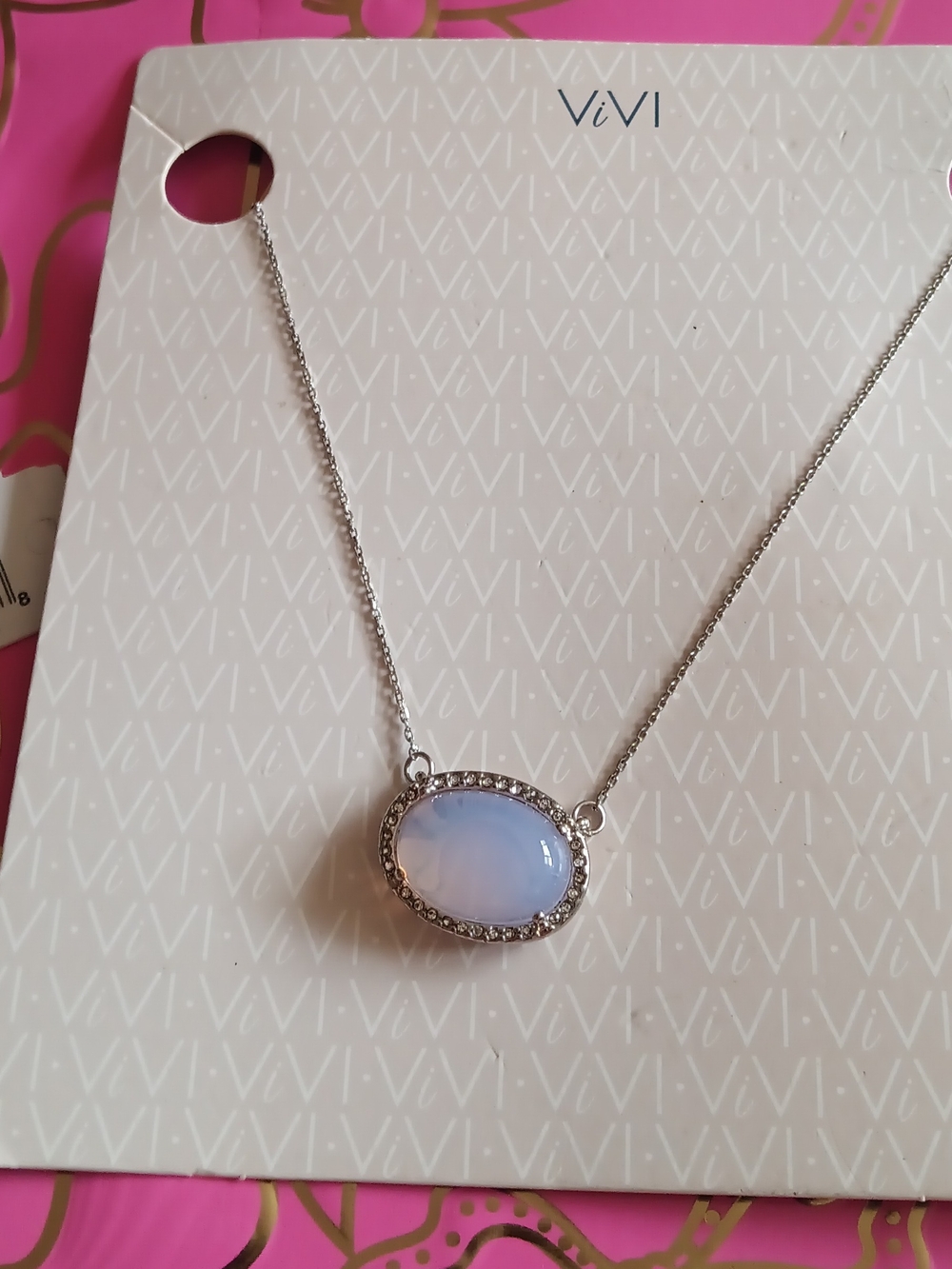 ViVi Silver-Tone Pale Blue Oval Pendant Necklace with Crystal Accent
